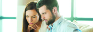 Man and woman looking at paperwork