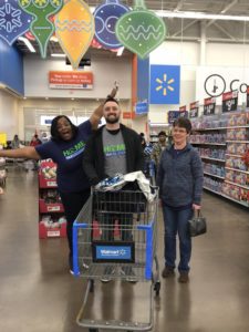 Happy Holidays from Our Home Tax Solutions Family to Yours 9 Team members getting ready to shop for Angel Tree gifts