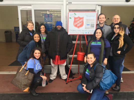 Home Tax Solutions team ringing Salvation Army bell